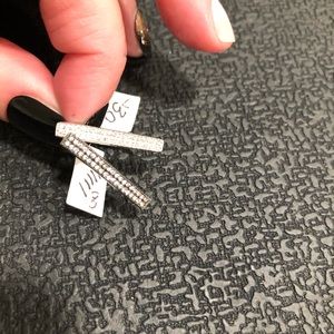 Two cute rings, brand new … sterling silver and gun metal